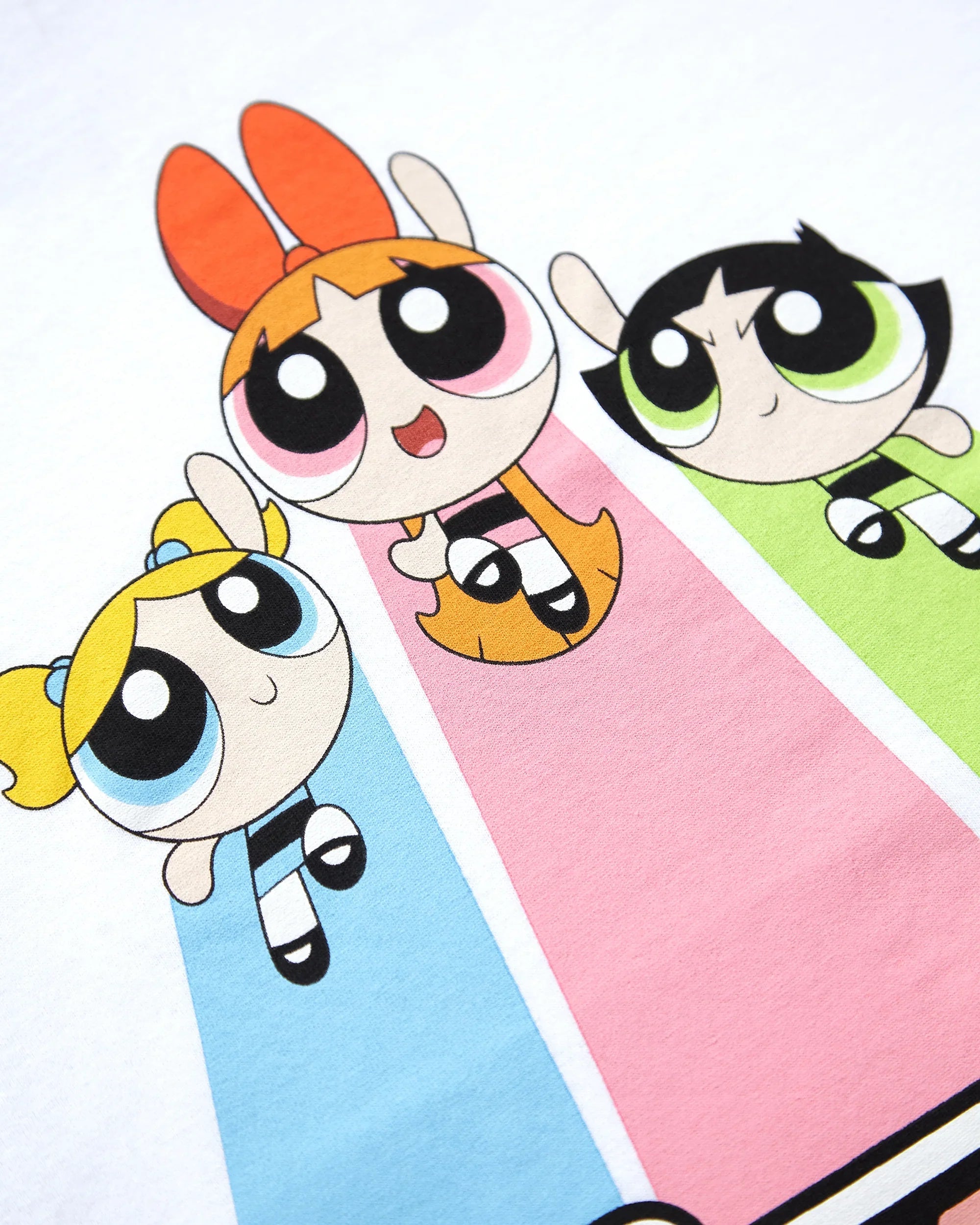Official Power Puff Girls flying trio, low cut cropped tee on white